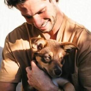 Man with dog | Luxury Dog Treats | Ruffingtons